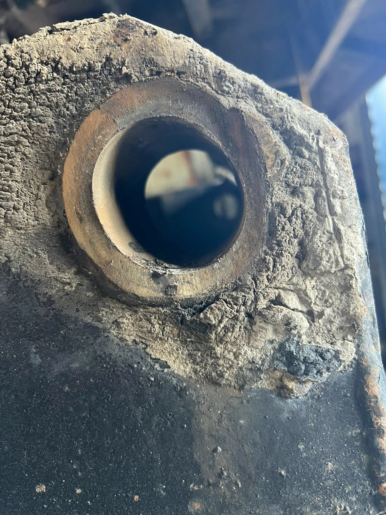 Worn pin bore inspected before being built up and re-machined